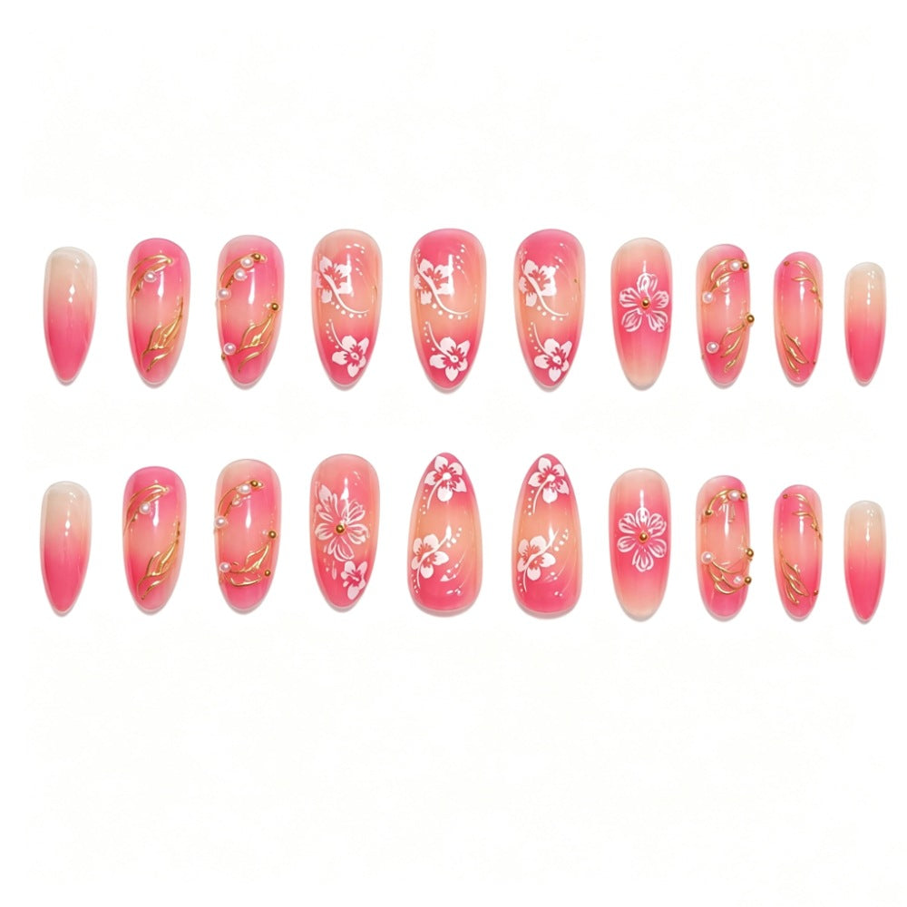 Künstlerisches Nagelkunst Press-On Nagelset mit floralen und goldenen Akzenten Karnz