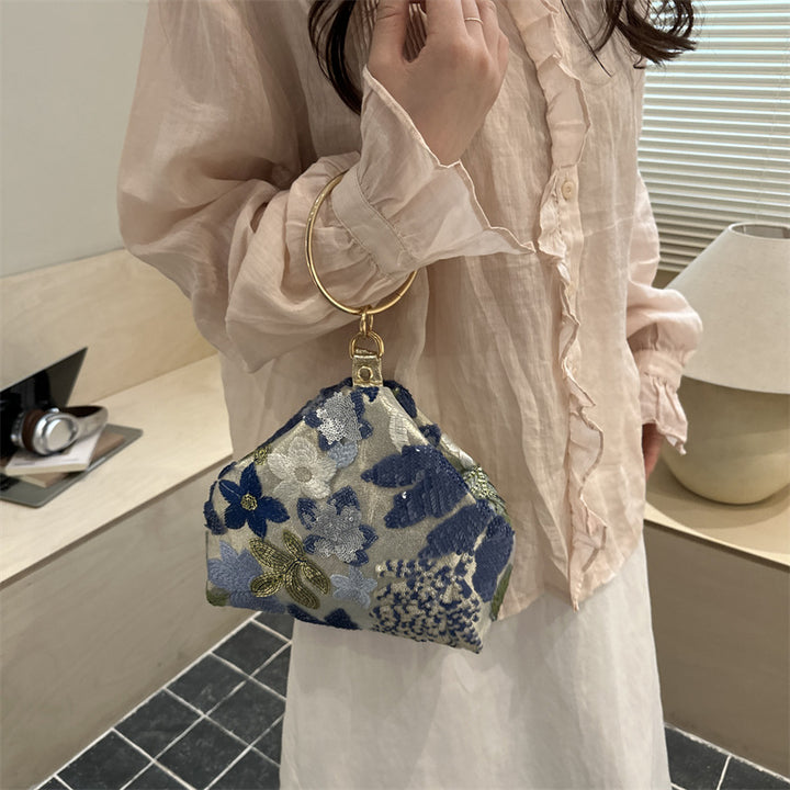 Elegante gestickte Clutch