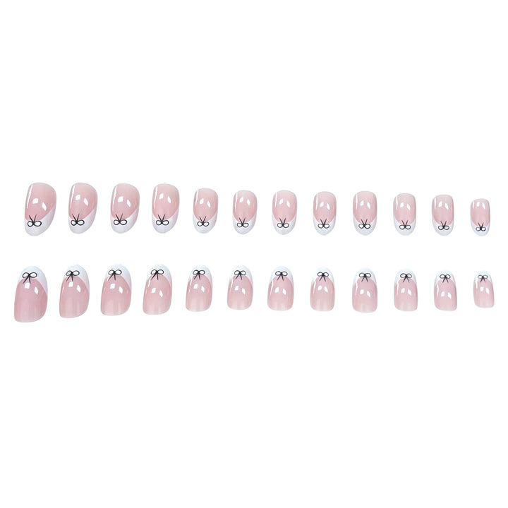 Künstlerische Schleifen-verzierte Nagelkunst Karnz