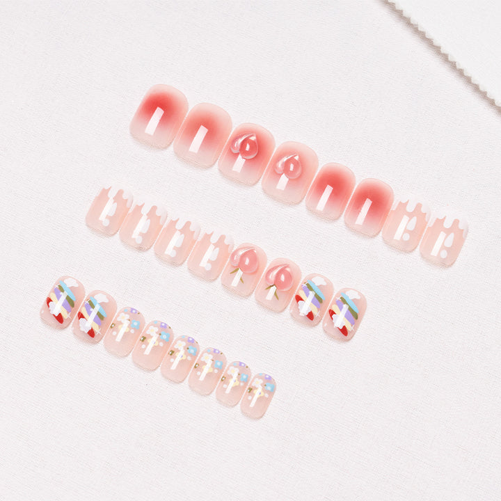 Dekorative Nagelkunst mit Früchten und Pastell-Designs