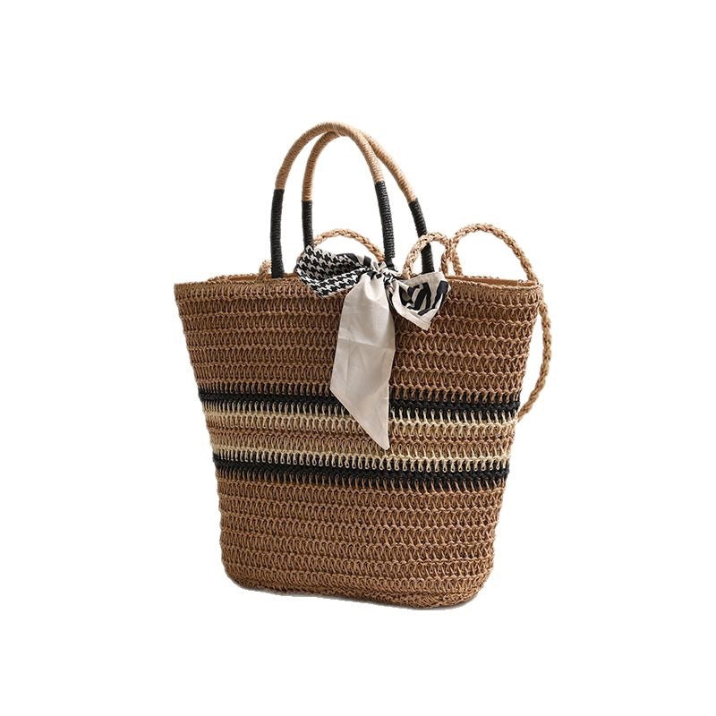 Damen Handtasche aus geflochtenem Naturmaterial mit modischem Akzent Karnz