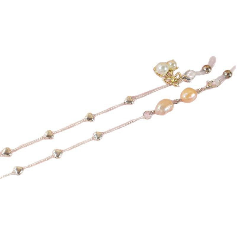 Elegantes Schmuckband mit Perlen und Silbernen Akzenten Karnz