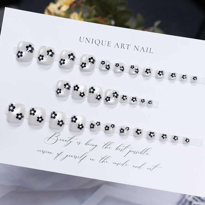 Florale dekorative Pediküre Nagelkunst