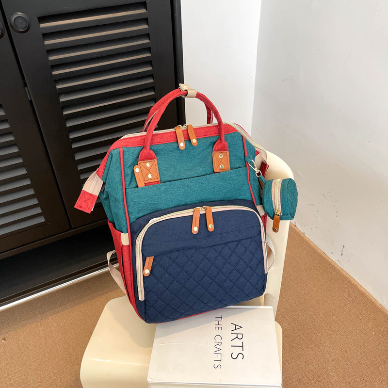 Multi-Taschen Stepp Rucksack Karnz