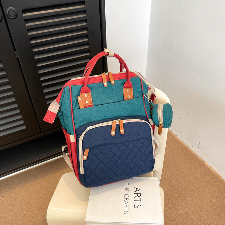 Multi-Taschen Stepp Rucksack Karnz