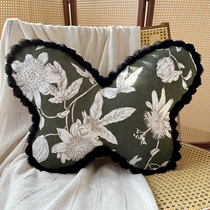 modernes und dekoratives Kissen im Schmetterlingsdesign