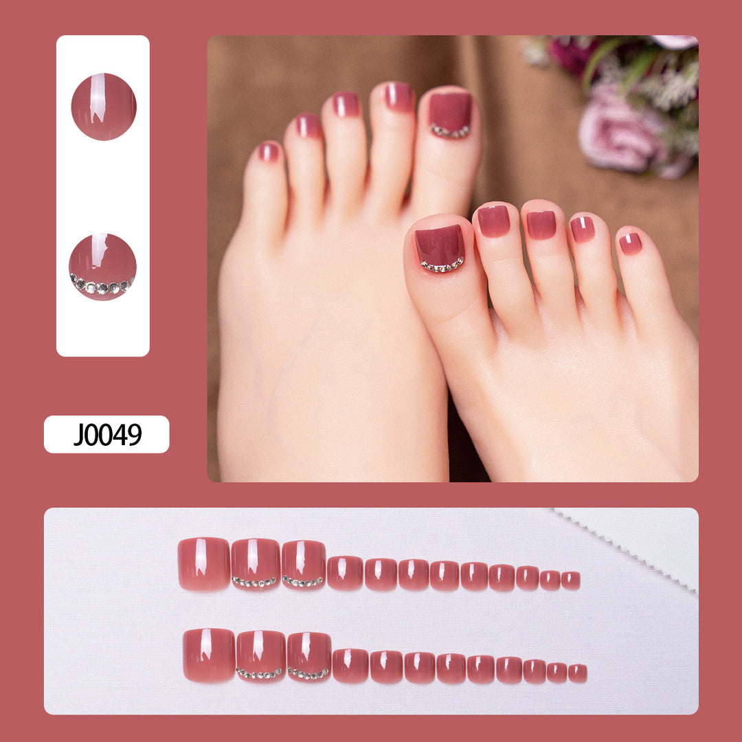 Glitzernde French Tip Zehennagelkunst