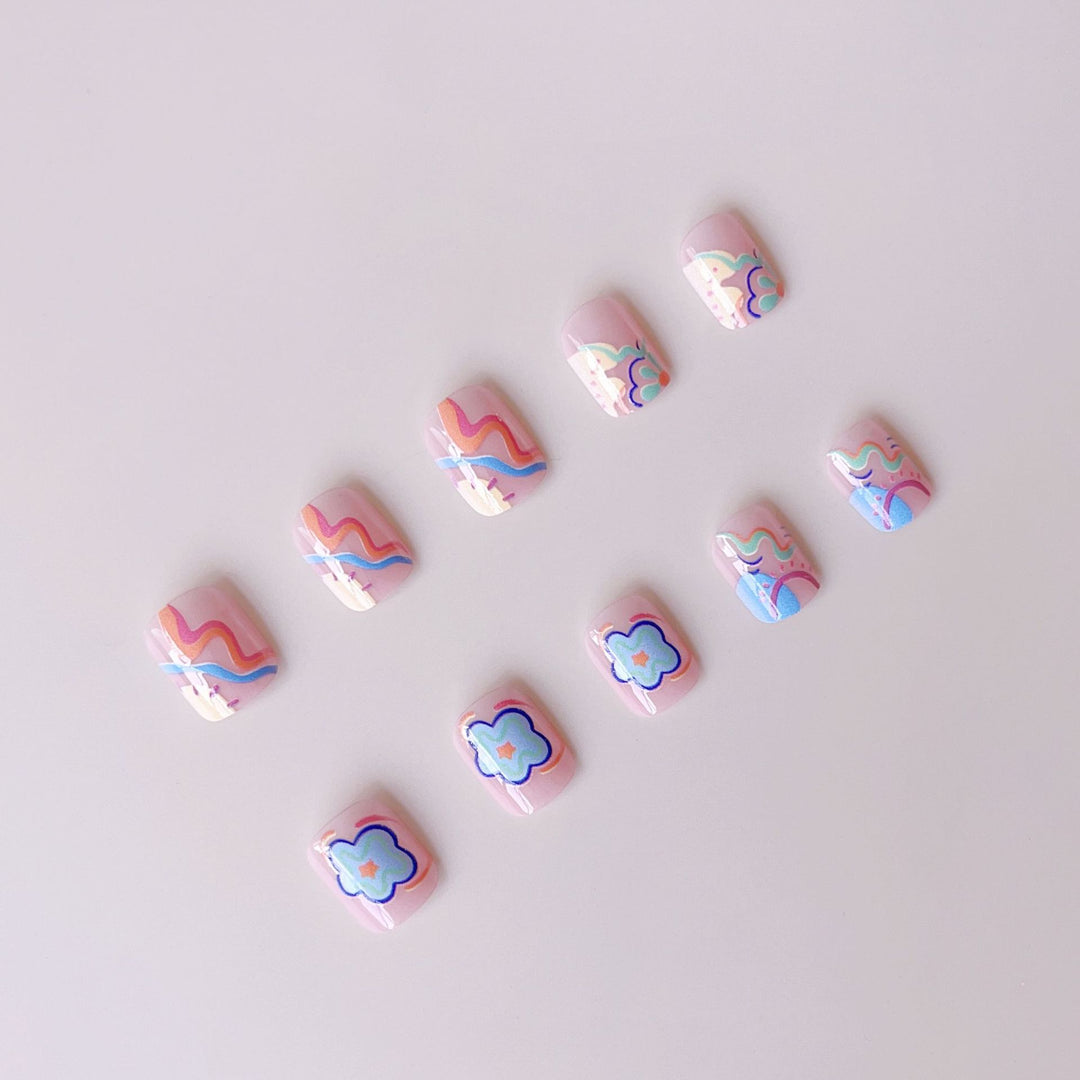 Kunstnagelset mit buntem zur Neonfarben inspirierten Design Karnz