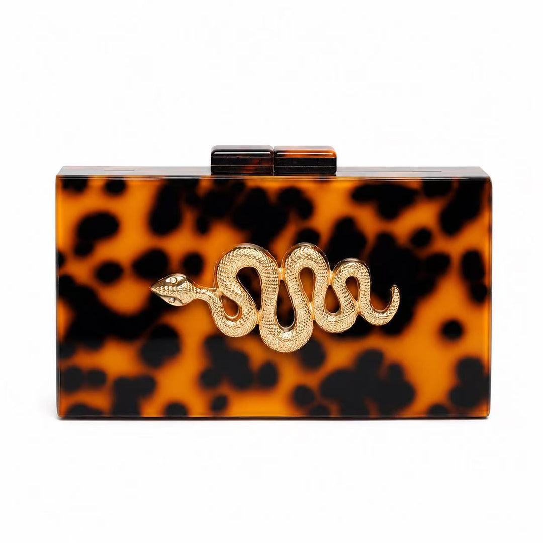 Exotische mit Schlangenverzierung aus Acryl gefertigte Clutch