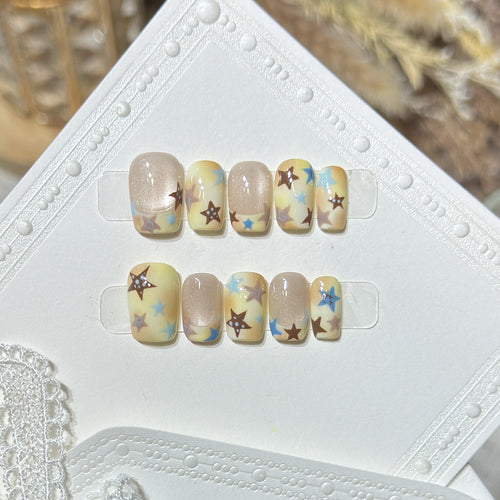 Press-On Nagelkunst Set mit Sterne Akzenten Karnz