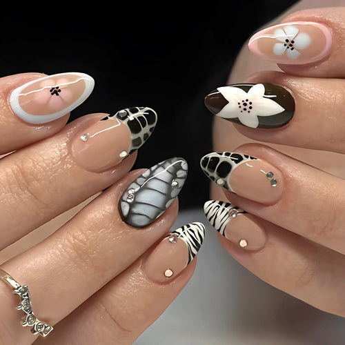 Künstlerisches Press-On Nagelset mit floralem und texturiertem Design Karnz