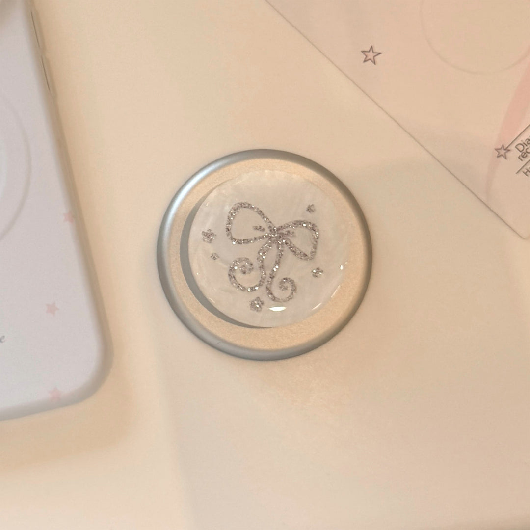 Stilvoller Smartphone Fingerhalter mit Glitzer Schleifendesign Karnz