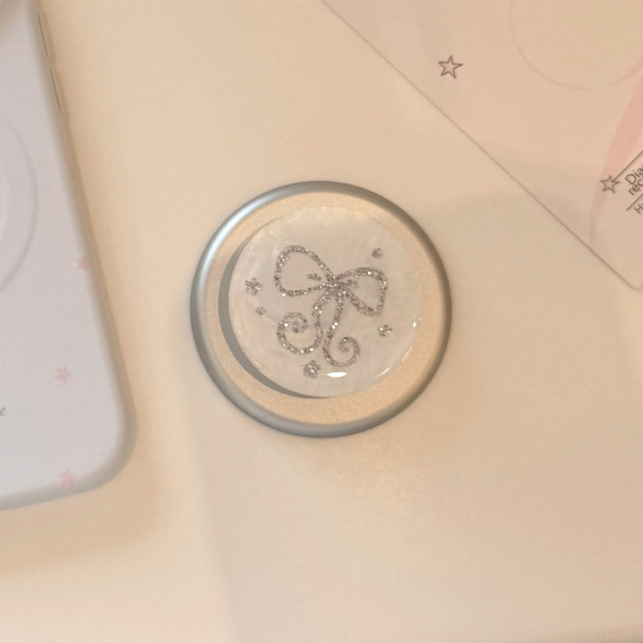 Stilvoller Smartphone Fingerhalter mit Glitzer Schleifendesign Karnz