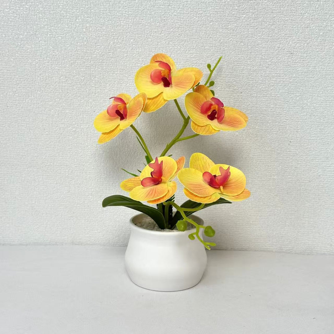Elegante künstliche Orchideenpflanzenarrangement für die Wohnkultur
