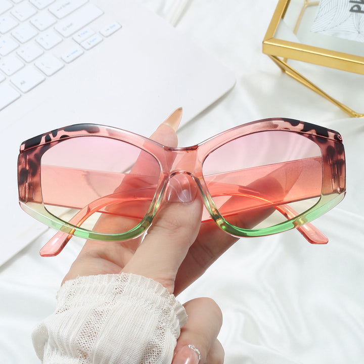 Damen modische Sonnenbrille mit markantem, futuristischem Design Karnz