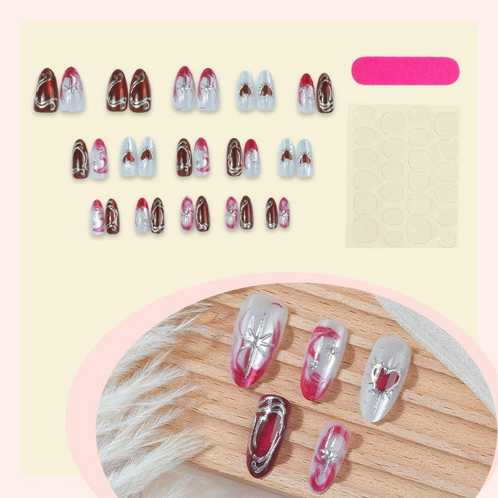 Kunstnagelset mit eleganten Herz- und Glitzermotiven Karnz