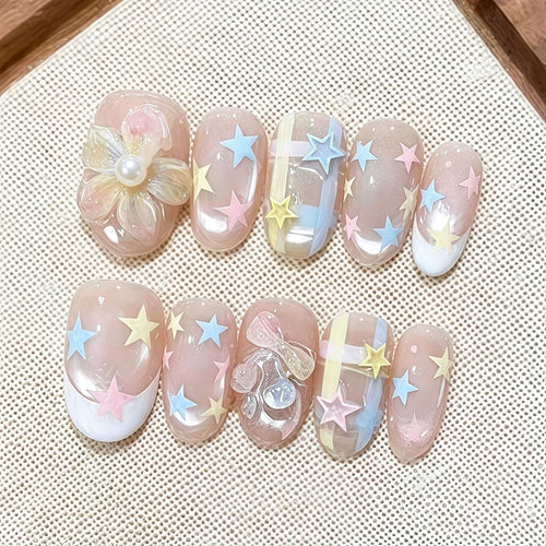 Kunstnail Press-On Set mit Stern- und Blumendesigns