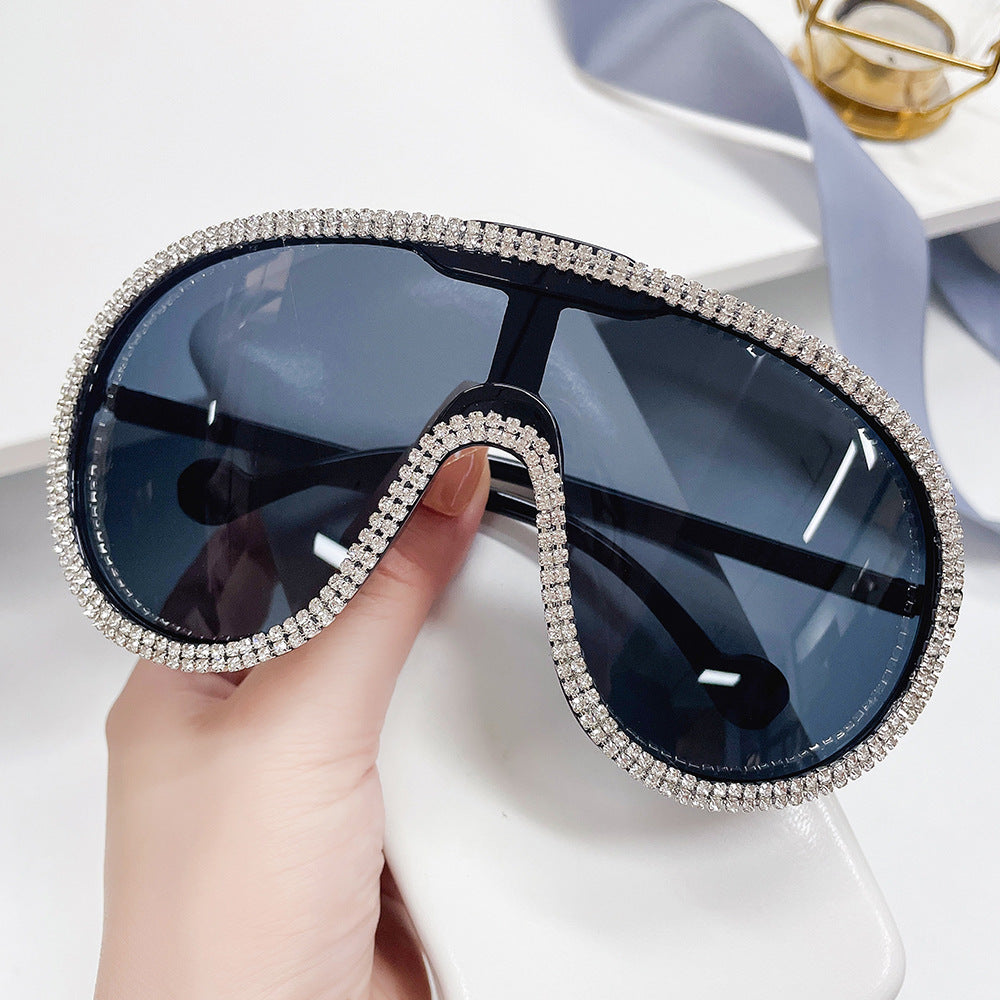 Damen extravagante Sonnenbrille mit funkelndem Rahmen Karnz