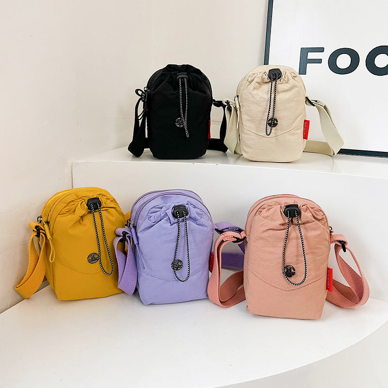 WoCompact Drawstring Crossbody Bag Karnz
