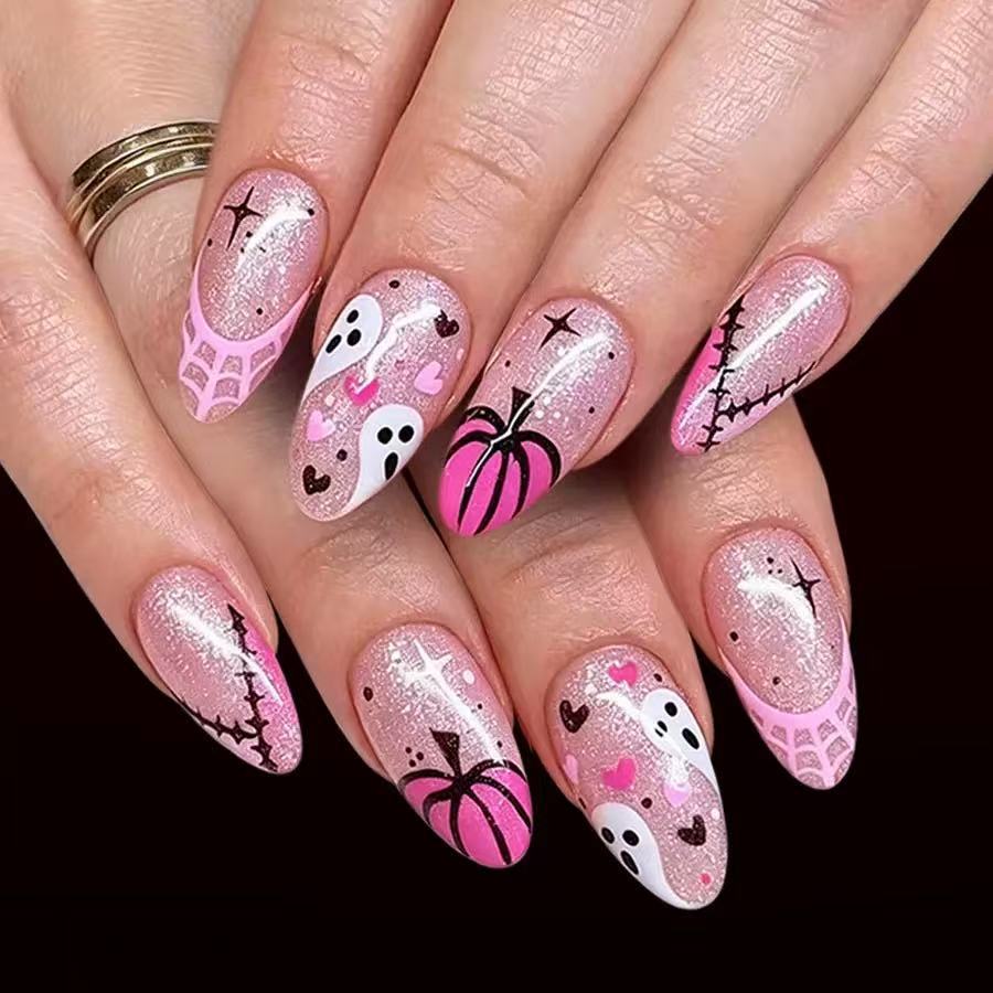 Kunstnagelset mit kreativem Halloween-Motiv und Glitzer Karnz