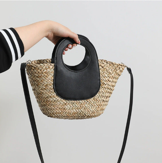 Damen Handtasche aus geflochtenem Material mit Lederdetails Karnz