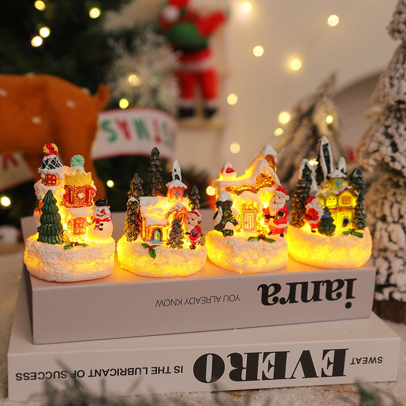 Weihnachtliche Miniaturbeleuchtung mit Schneeszenen Karnz