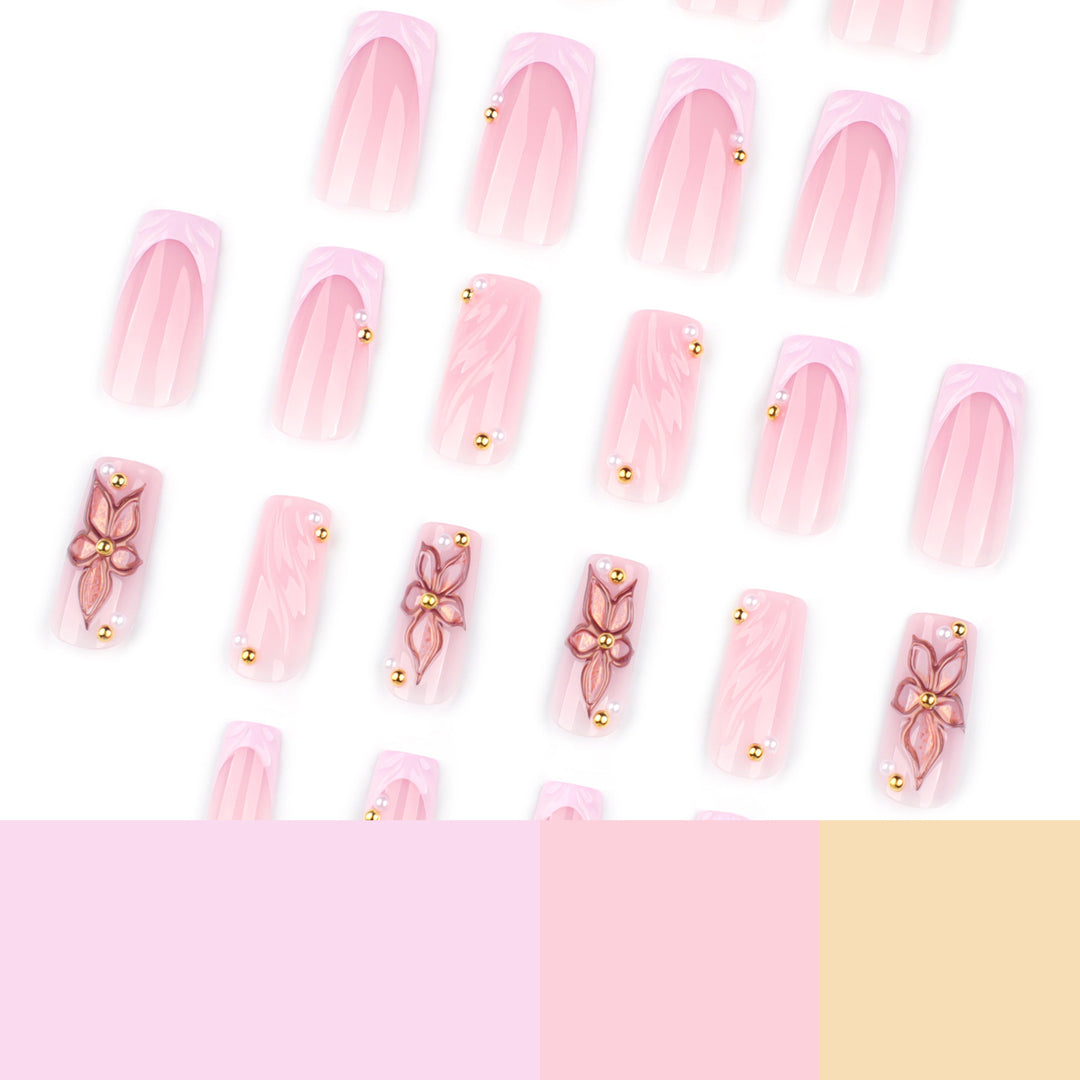 Kunstvolle Acryl-Nägel mit Blumendesign und Glitzervariationen Karnz
