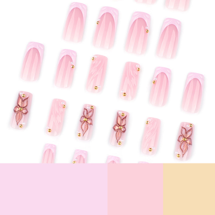 Kunstvolle Acryl-Nägel mit Blumendesign und Glitzervariationen Karnz