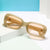 Damen modische quadratische Sonnenbrille mit breitem Rahmen und UV-Schutz Karnz