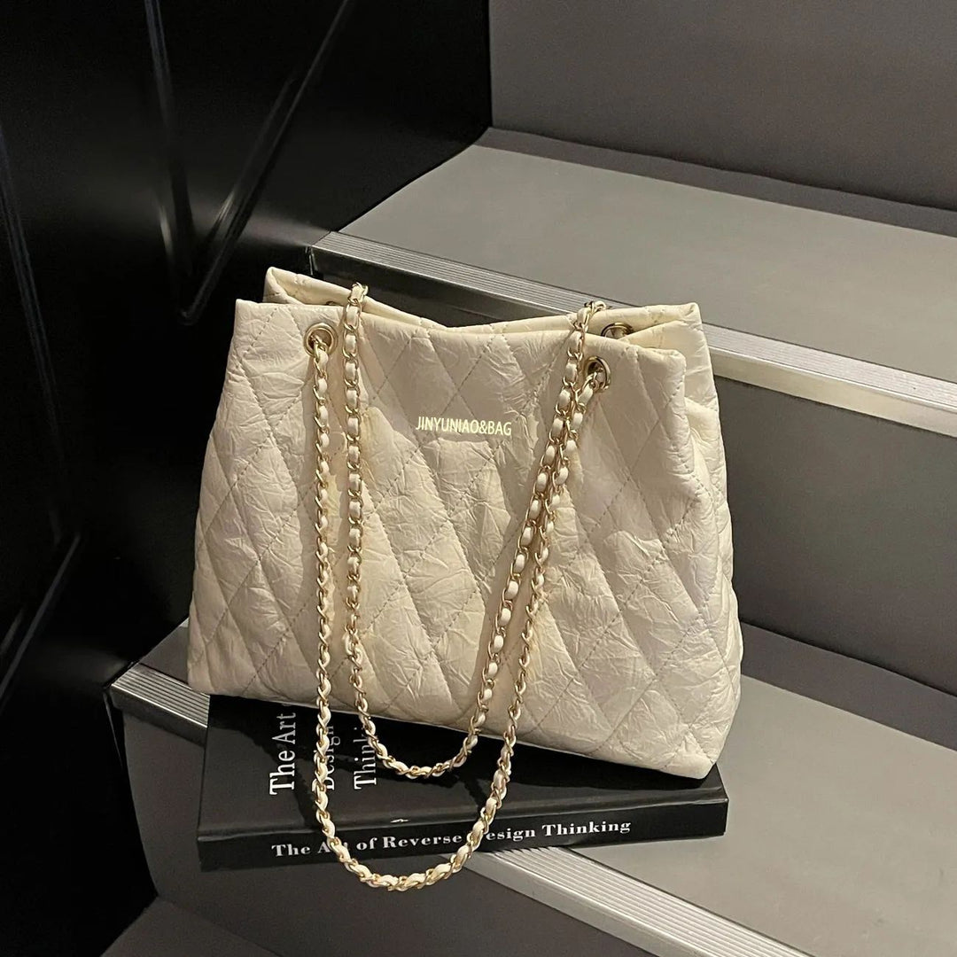 Gepolsterte Handtasche mit Kettengriff Karnz