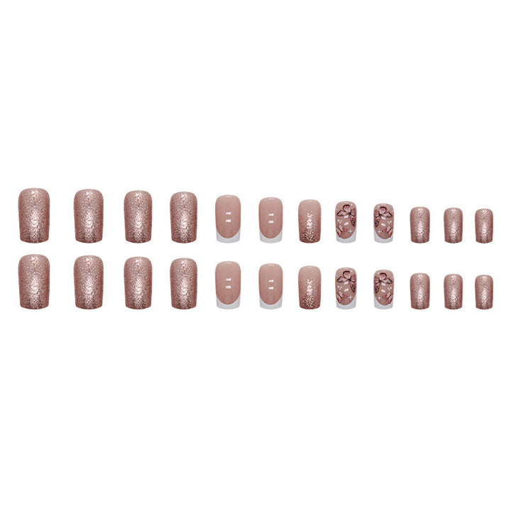 Dekorative Schmetterling- und Glitter-Nagelkunst Karnz