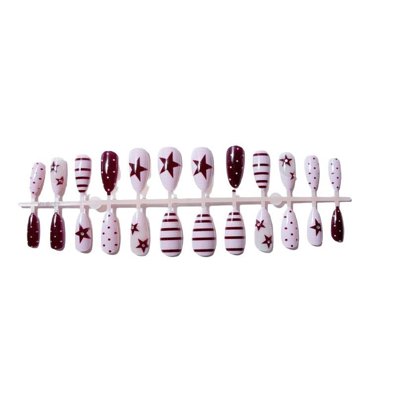Kunstvolle Nagelset mit festlichem Sternen-Design Karnz