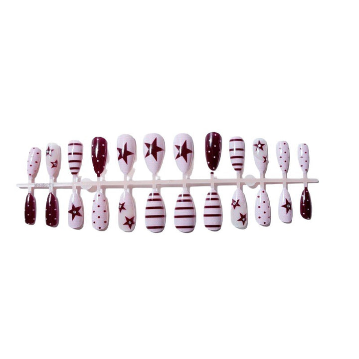 Kunstvolle Nagelset mit festlichem Sternen-Design Karnz