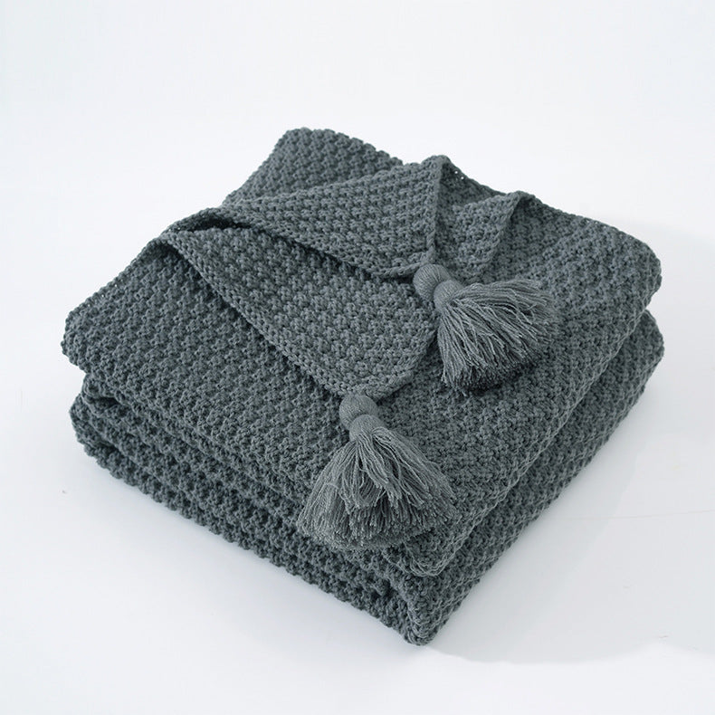 Strukturierte Strickwurfdecke
