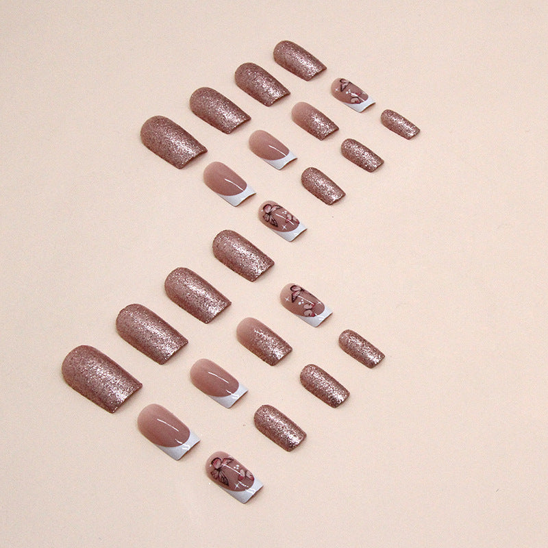Dekorative Schmetterling- und Glitter-Nagelkunst Karnz