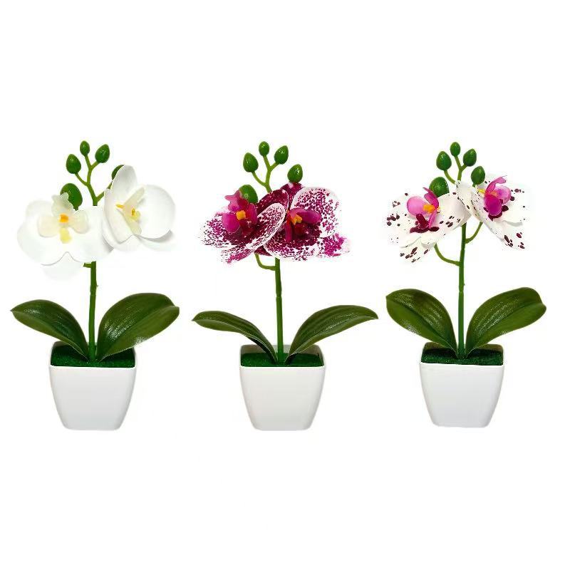 Dekorative künstliche Orchideenarrangement für die Wohnkultur展示