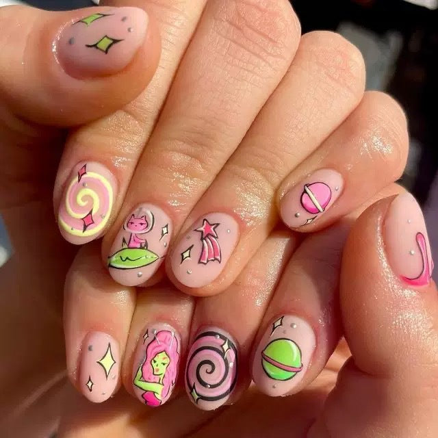 Kunstnagelset mit verspielten Cartoon-Motiven Karnz