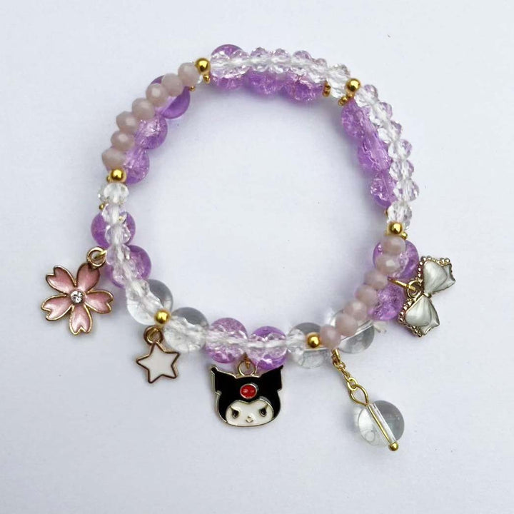 Elegantes Armband mit Tier- und Glitzeranhängern Karnz