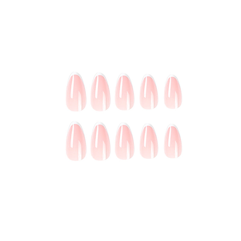 Kunstvolle Stiletto-Nägel mit elegantem French-Tip Design Karnz