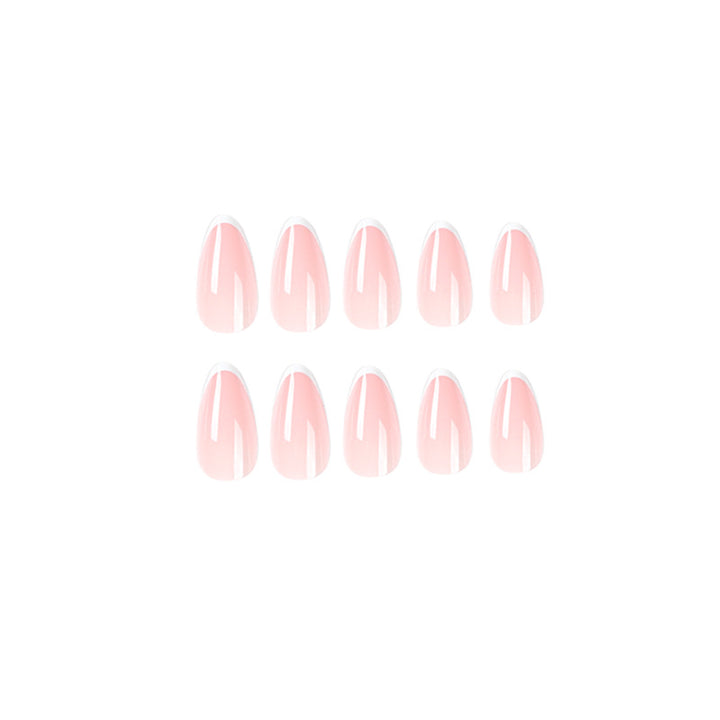 Kunstvolle Stiletto-Nägel mit elegantem French-Tip Design Karnz