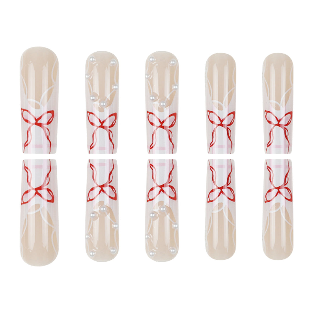 Dekorative Druck-Nagelkunst mit Bandakzenten Karnz