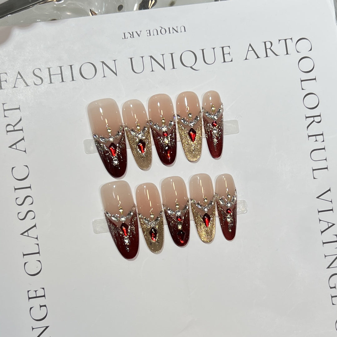 Dekoratives Stiletto Press-On Nagelset mit Edelsteinakzenten Karnz