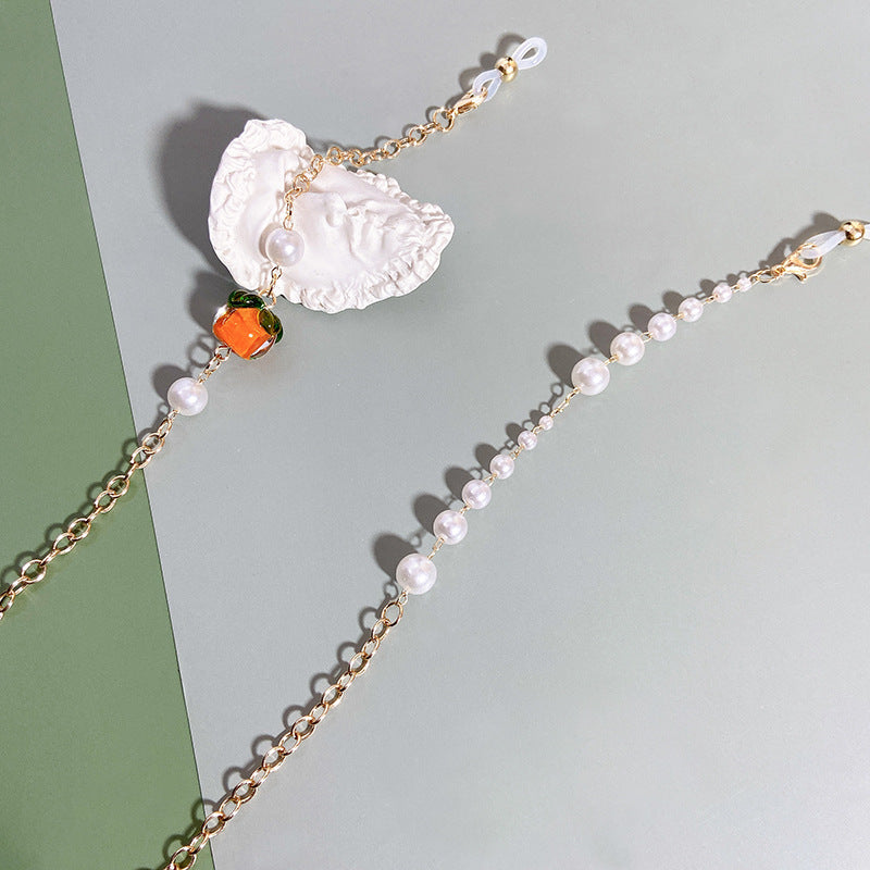 Elegante Kette mit Perlen und Rubinen Karnz