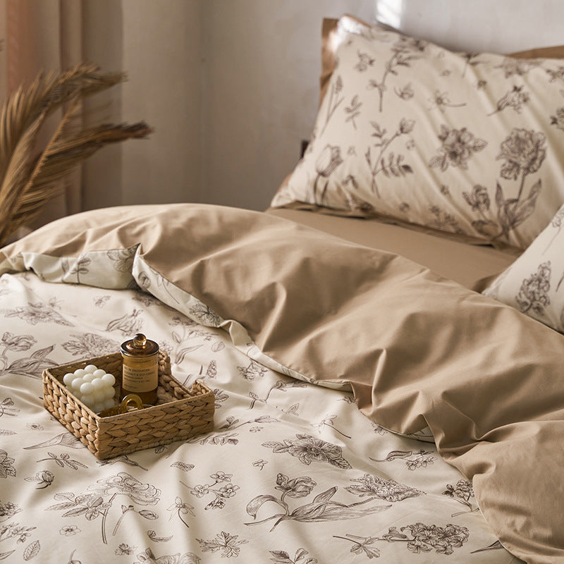Wendbares Bettwäsche-Set aus Baumwollsatin mit botanischem Skizzenprint und glattem Rückseitenbezug