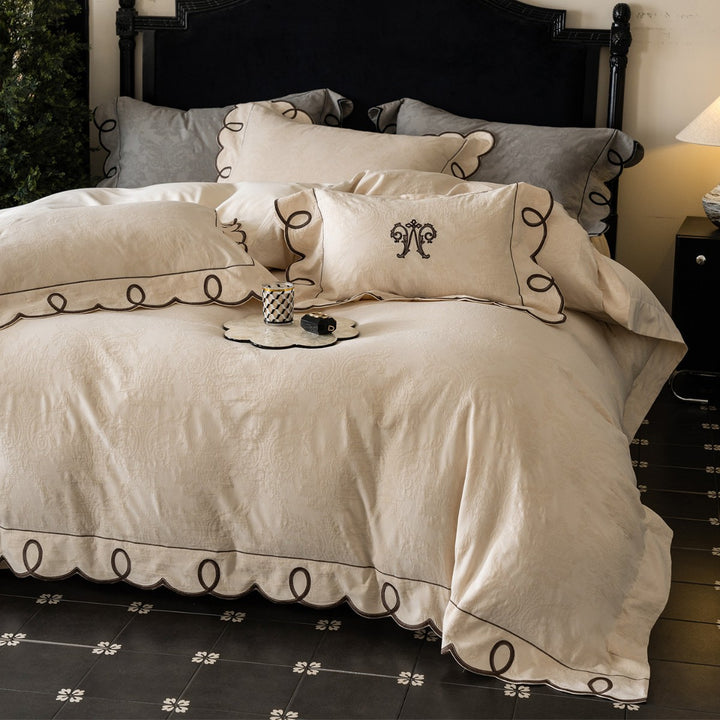 Besticktes Wellen-Loop Jacquard Bettbezug-Set mit passenden Kissenbezügen