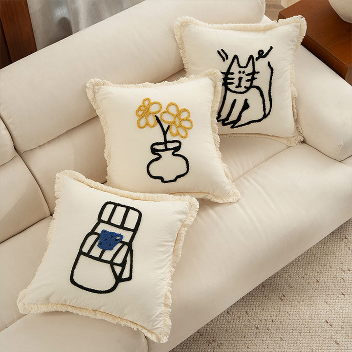Gewebter Zierkissenbezug mit gesticktem Café‑Motiv und dekorativem Fransenrand Karnz