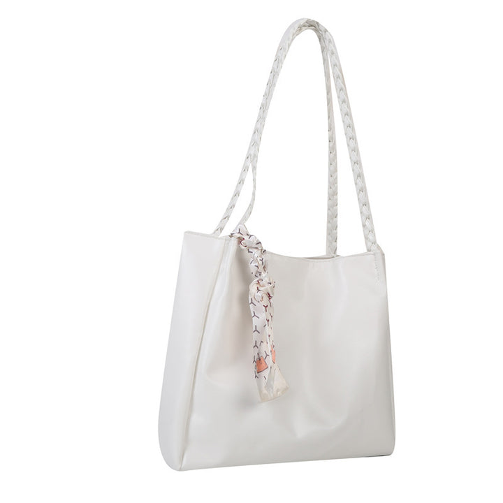 Glänzende Kunstleder Shopper Tasche mit geflochtenen Trägern