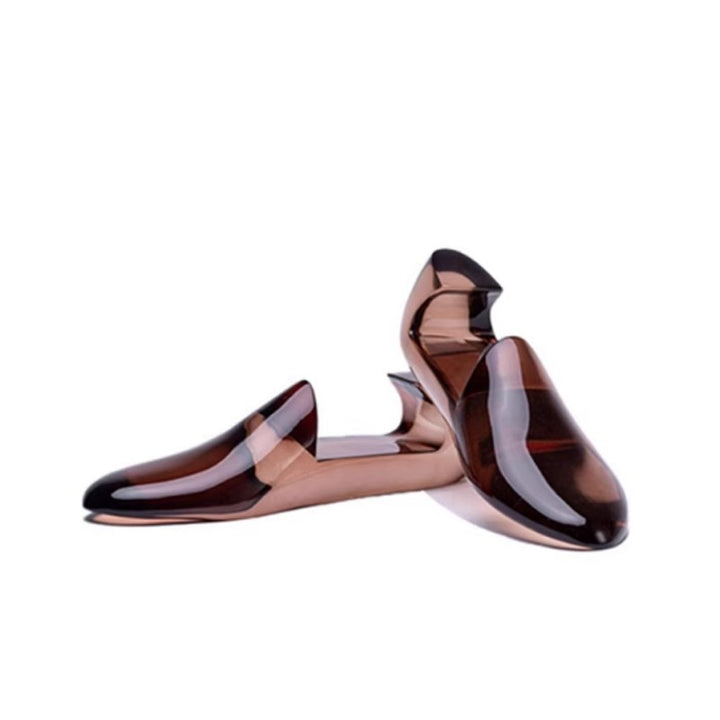 Skulpturale Absatz-Mules