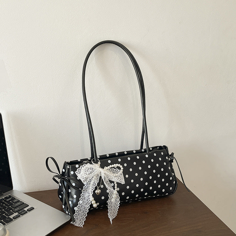 Dekorative Pünktchen-Handtasche