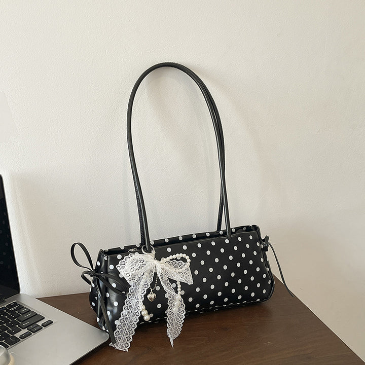 Dekorative Pünktchen-Handtasche